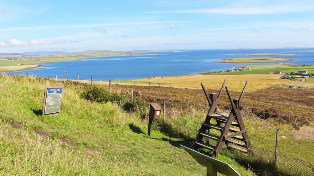Cuween Cairn looking over Firth in Orkney