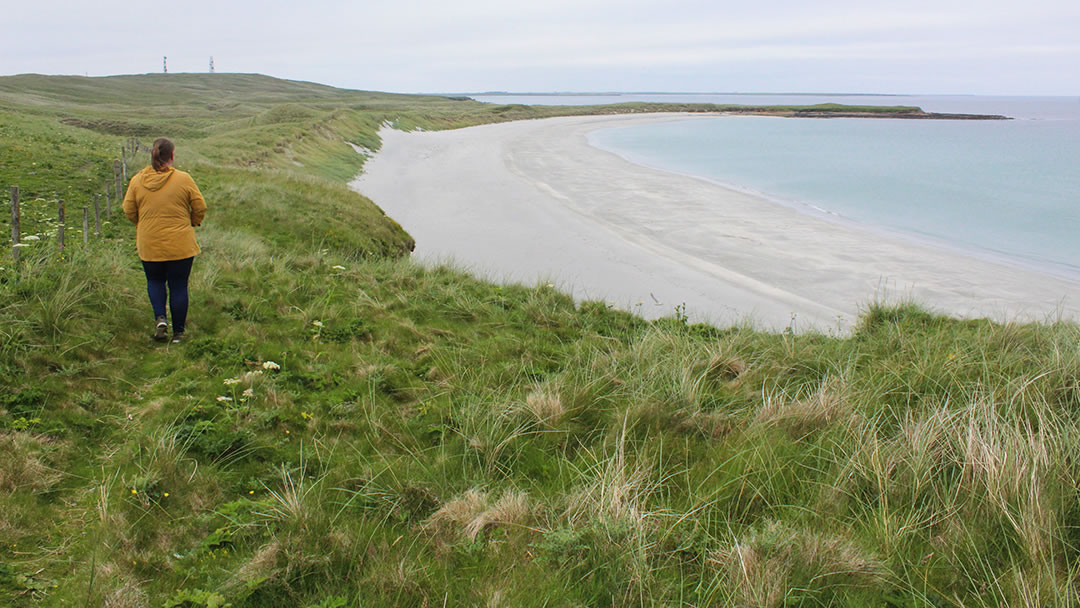 Descending to Doun Helzie in Sanday Orkney