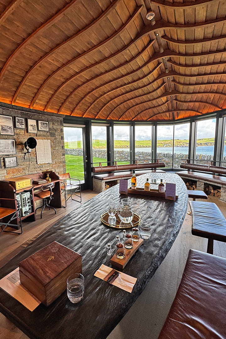 Tasting room in Scapa Distillery with an upturned boat hull as a roof